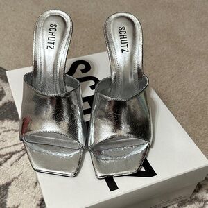 SCHUTZ Metallic Silver Mules NWOT size 9